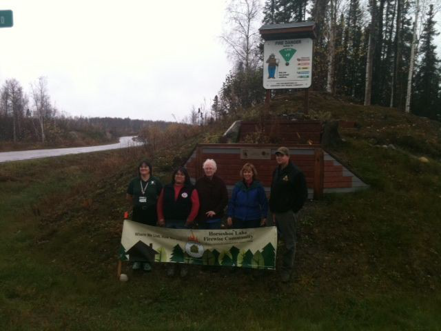 Ken Bullman, Mat Su Area Forester, presents community activists and Firewise Board members