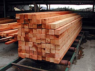 View of lumber stacked at a mill.